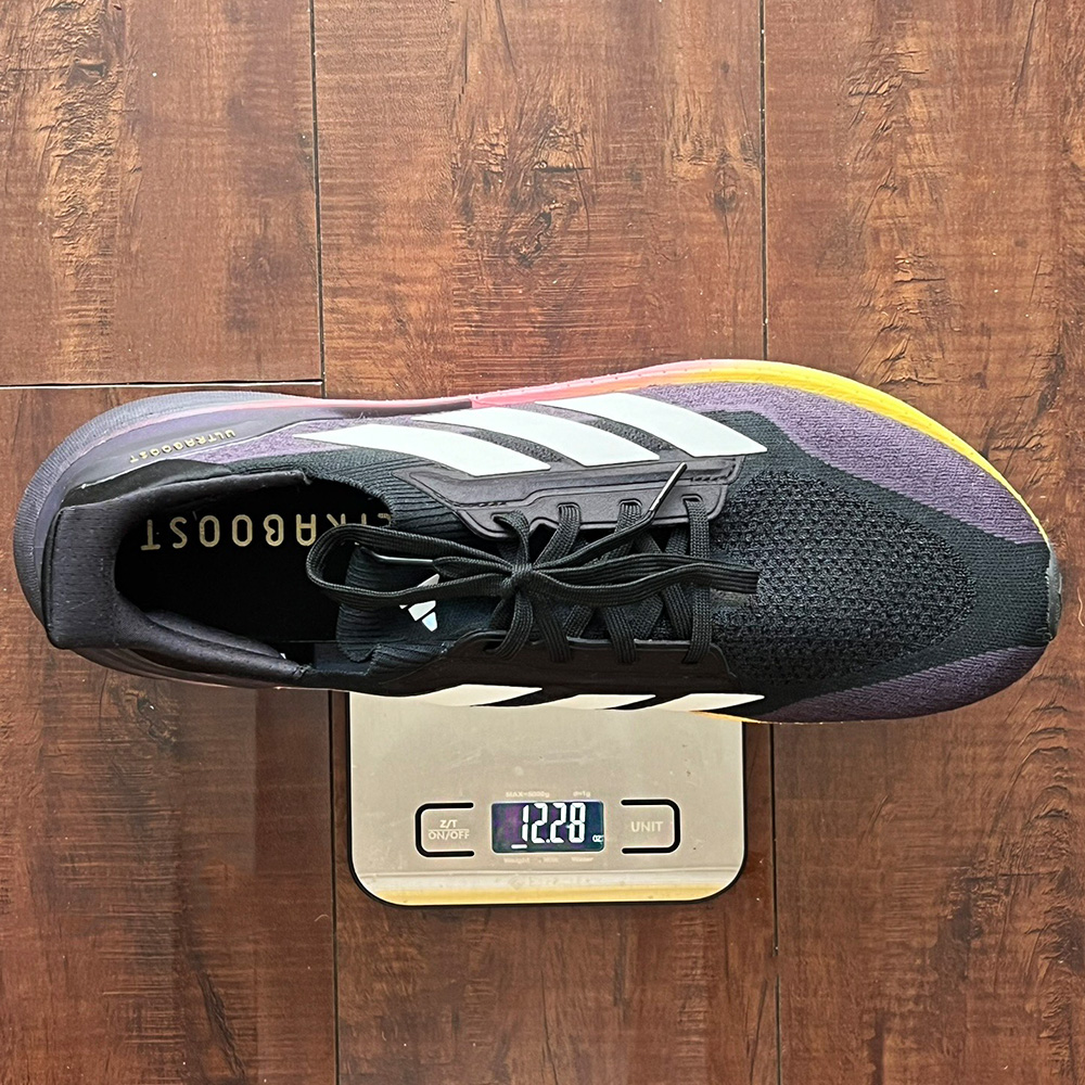 black shoe on a white scale
